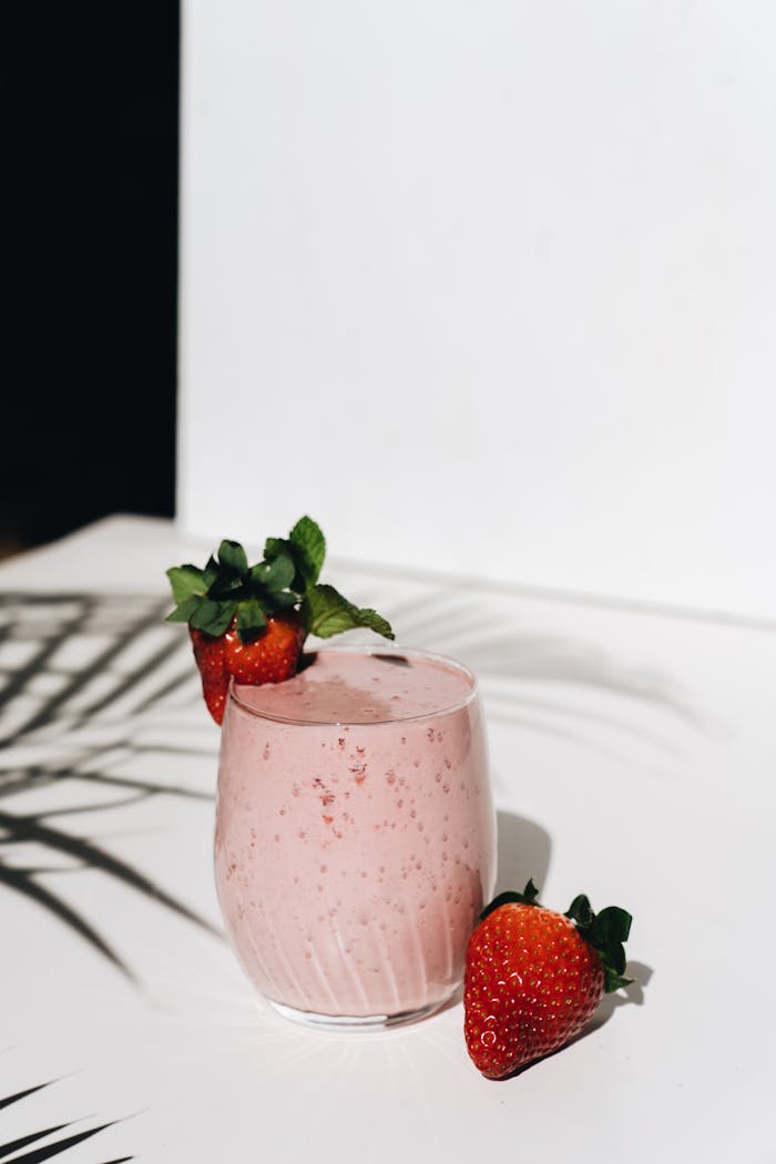 services-cta Delicious strawberry smoothie in a glass, perfect for a healthy lifestyle.